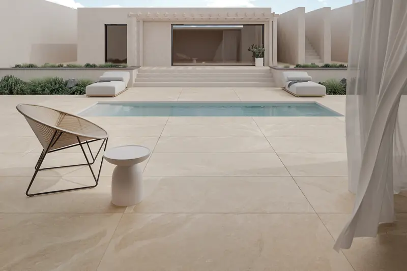 Pool surround and terrace paved with 20 mm outdoor porcelain tiles